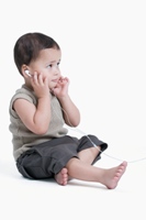 Little boy listening to music